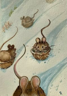 three mice are sitting in the snow