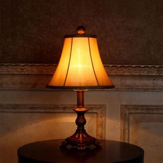 a lamp on a table in a room