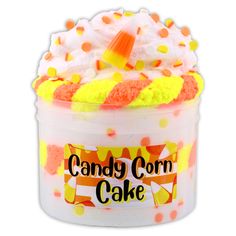 a candy corn cake in a plastic container