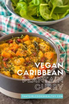 vegan caribbean plantain curry in a bowl with lettuce on the side