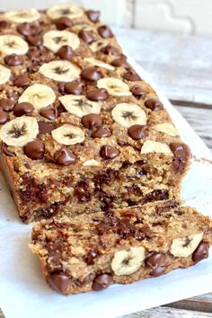 chocolate and banana granola bars are sitting on a napkin