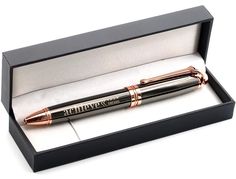 a pen in a gift box with its lid open to show the writing on it