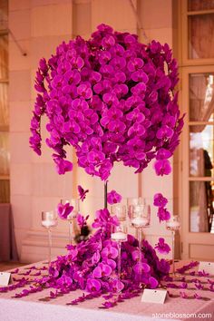 the centerpiece is made up of purple flowers