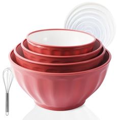 a stack of red bowls with whisk attachments