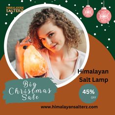 an advertisement for a christmas sale with a woman holding a lantern in front of her face