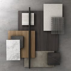 an assortment of different materials are arranged on a table with grey walls and flooring