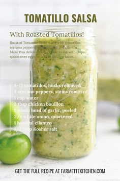 the recipe for tomato salsa is in a jar and it has green apples around it