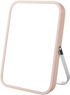 a light pink mirror with a metal frame