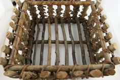 a basket made out of branches and sticks