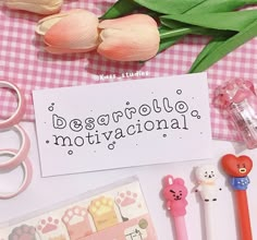 there is a sign that says descarrolle motivational next to some scissors