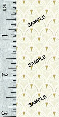 a ruler with the word sample on it and an image of a scale in front of it