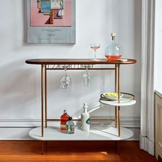 a bar cart with drinks on it in a room