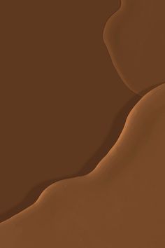 an abstract image of the desert with brown and tan colors, including sand or grass