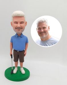 a custom bobble head with a man holding a golf club and smiling at the camera