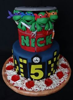 there is a cake made to look like teenage mutants