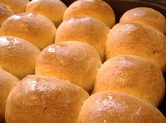 bread rolls in a baking pan ready to be baked into buns for dinner or dessert