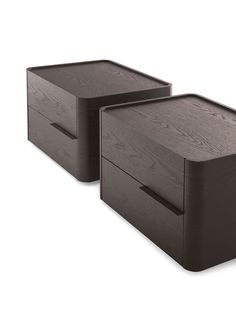 two wooden drawers sitting next to each other