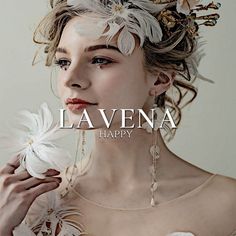 a woman with flowers in her hair and the words lavena happy