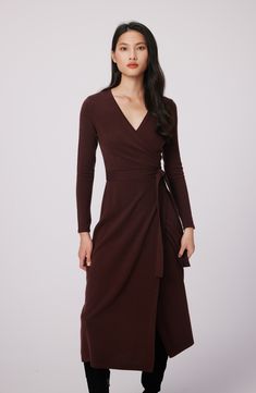 This quintessential wrap sweater-dress knit from luxe wool and cashmere features a sultry dipped neckline and waist-cinching sash. Surplice V-neck Long sleeves 70% wool, 30% cashmere Dry clean Imported Formal Fall V-neck Wrap Dress, Elegant Cashmere Sweater Dress For Winter, Elegant Long Sleeve Cashmere Sweater Dress, Brown Fitted V-neck Wrap Dress, Fitted Cashmere Sweater Dress For Fall, Elegant Cashmere Dresses, Elegant Cashmere Sweater Dress For Work, Elegant Winter Cashmere Dress, Fitted Cashmere Dresses For Fall