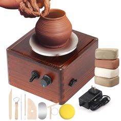 a potter's wheel being used to make a clay pot on top of a wooden box