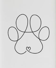 a dog's paw with a heart drawn on the back of it in black ink