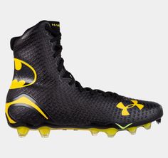 the under armour batman football cleats are black and yellow