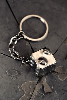 GATE OPEN A cursed cube, a "taboo object", a living barrier so powerful that there is nothing it cannot seal... and now handcrafted into one of the most unnatural keychain you'll ever see. Made from solid stainless steel, this keychain has a substantial weight and play value that is oddly satisfying. Materials: Stainless Steel, each dice weighs 30 grams (equal to one dozen pennies). GATE CLOSE Silver Metal Keychain As Gift, Silver Metal Keychains As Gifts, Silver Metal Keychain For Gift, Inverted Spear Of Heaven, Prison Realm, Cursed Items, Wallet Chains, Pushing Daisies, Anime Jewelry