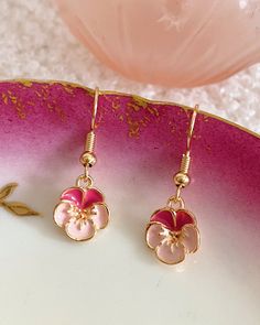 Our charming Rosy Flower Drop Earrings are a delicate design inspired by blooming flowers. The rosy hue adds a touch of warmth and romance to the piece, while the lightweight structure ensures comfortable wear all day long. Crafted from stainless steel, these earrings will not flake off and stay perfectly chic wherever you go. Perfect for adding a feminine and whimsical touch to any ensemble, these earrings are sure to become a cherished addition to your jewelry collection. Details & Care Stainl Lightweight Structure, Feminine Jewelry, Flower Drop Earrings, Rose Blush, Delicate Design, Earrings Pink, Pink Blush, Girly Jewelry, Blooming Flowers