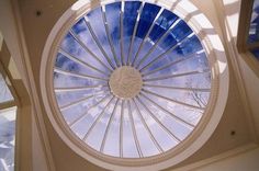 the inside of a building with a circular window