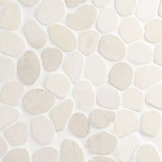 white and gray stones are arranged in a pattern