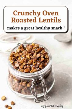 crunchy oven roasted lentils in a glass jar with text overlay that reads, crunchy oven roasted lentils makes a great healthy snack