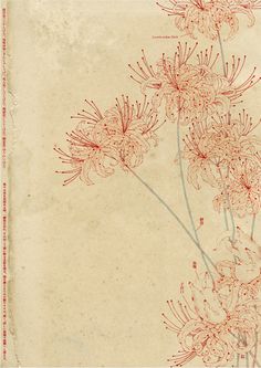 an old paper with red ink on it and some flowers in the middle, sitting next to each other