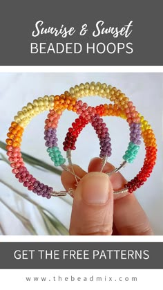 a person holding four different colored beads in their hands, each beaded with an individual's name