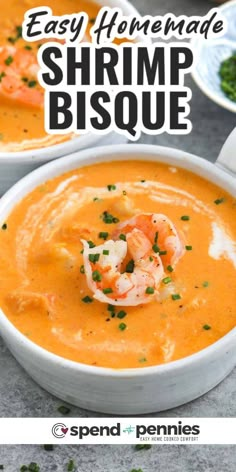 two bowls filled with shrimp bisque and garnished with parsley