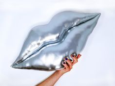 This bespoke big shaped silver lip pillow is decorative yet playful. It's unique,designed and handmade in UK. Exceptional prop for movies, photo shoots, hen parties, weddings, etc. The material is stretch Lycra and the inner part is super soft Non -Allergenic soft polyester fibre filling - Carded Hollow fibre. The size is approximately 23 inches (58cm) X 11 inches (28cm) Other sizes / materials/ colours available upon request. I will do my best to meet your expectations. Thank you for looking at Lip Pillow, Aesthetics Clinic, Lips Pillow, Hot Lips, Purple Art, Best Pillow, Cotton Velvet, Pink Velvet, Pillow Cushion