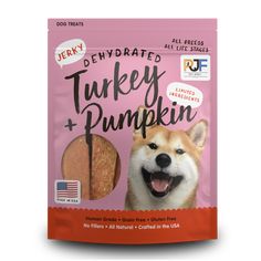 a bag of turkey and pumpkin dog treats with an image of a dog's face