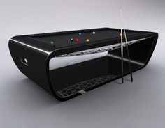 a pool table with two cues in it