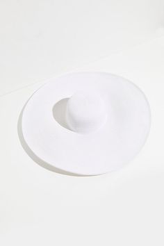 Stay in the shade at the beach and beyond with this super oversized straw hat featuring a large, floppy brim.* Lightweight * Packable, unstructured design White Wide Hat, White Coastal Straw Hat For Vacation, White Coastal Style Straw Hat For Vacation, Wide Brim Sun Hat With Upf 50+ For Pool, Lightweight Beach Hat For Beachwear, Lightweight Beachy Straw Hat For Sunbathing, Chic Packable Straw Hat For Summer, Lightweight Beachwear Hat For Beach, Chic Summer Straw Hat Packable