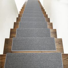 the carpeted stairs are lined up in rows