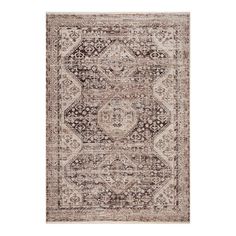 an antique style rug in beige and brown tones