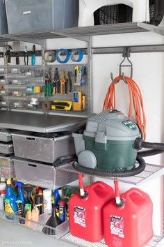 an organized garage storage area with various items