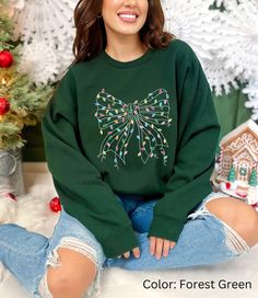 About this product: Coquette Bow Christmas Sweatshirt, Festive Girly Holiday Sweater, Cozy Merry and Bright Shirt, Preppy Most Wonderful Time Plus Size Crewneck 🌟 Welcome to My Store! 🌟 Hello and welcome to TrendshopShop on Etsy! 🎉 I'm so excited to have you here, and my number one goal is to make sure you're absolutely thrilled with your purchase. To me, you're more than a customer - you're a valued friend! 💖 If you have any questions or are dreaming up a custom design, just drop me a messa Merry And Bright Shirt, Pharmacist Shirt, Bow Graphic, Pharmacist Gift, Bow Christmas, Dtf Printing, Coquette Bow, Gildan Sweatshirts, Holiday Sweater