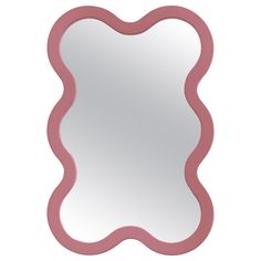 a pink scalloped mirror on a white background