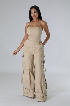 Non-stretch jumpsuit, Spaghetti straps, Square neckline, Pockets, Straps, Wide-leg, Inseam is 32 inches.Model is wearing a small Cargo Two Piece Set, Baddie Classy Outfits, Cute Jumpsuit Outfits, Tailor Machine, Dungarees Outfit, The Olsen Twins, Fancy Short Dresses, Cargo Jumpsuit, Stretch Jumpsuit