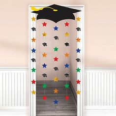 a door decorated with stars and a graduation cap