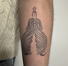 a person with a tattoo on their arm