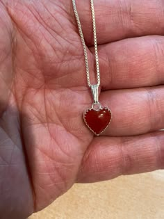 "* 10mm red carnelian heart Pendant *Sterling Silver *Free Shipping *Handcrafted In USA *Jewelry ship in Gift box *Necklace length: 16\" 18 inches or 20\" *Cabochon may vary in color *Lovely necklace with a pendant on a sterling silver chain with spring ring closure, this necklace is so pretty . A must for any occasion . Thank You For Looking ,And Check Out More Items In My Etsy Shop For More Great Deals, Also We Add More Jewelry To Etsy Shop Regularly https://www.etsy.com/shop/ABQdesign" Red Heart Necklace Silver, Carnelian Heart Pendant, Carnelian Heart Necklace, Silver Red Jewelry, Red And Silver Necklace, Red Heart-shaped Hallmarked Jewelry, Red Carnelian Necklace For Valentine's Day, Carnelian Heart Pendant Jewelry Gift, Sterling Silver Necklace With Heart Charm For Healing