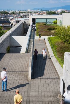 people are walking up and down the walkway