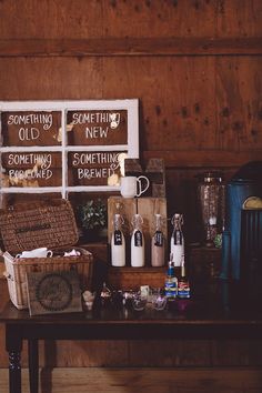 there are many items on the table in this room, including bottles and baskets for sale