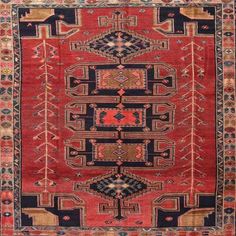 an antique persian rug with various colors and patterns